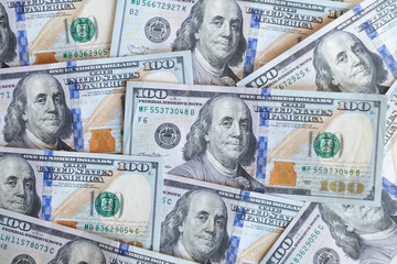 Money USA dollar banknotes for background.Money is any item or verifiable record that is generally accepted as payment for goods and services and repayment of debts