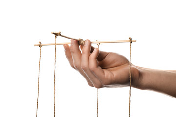 Hand of puppeteer on white background