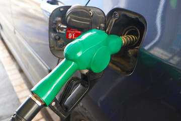 Gas station. Fuel pump.Colorful petrol pump filling nozzles.