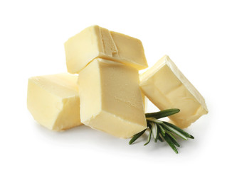Pieces of butter on white background