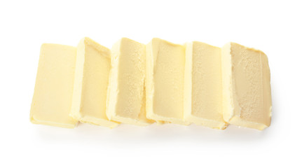 Pieces of butter on white background