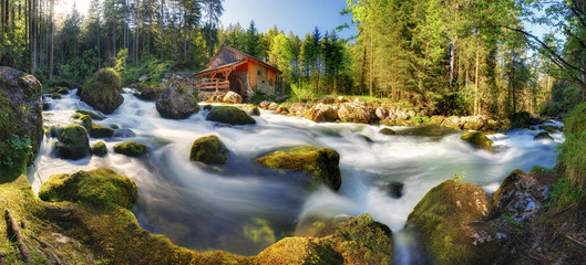 Austria landscape with waterfall and watermill near Salzburg, Golling Alps