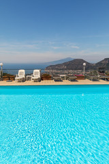 Swimming pool on the Amalfi Coast with views of the Gulf of Naples and Vesuvius. Sorrento. Italy