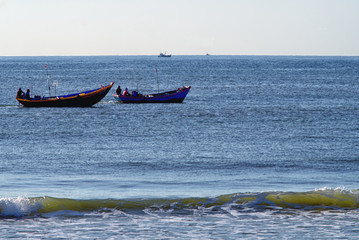 fishermen at work in the Gulf of Mui Ne