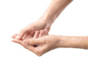 Woman washing hands on white background