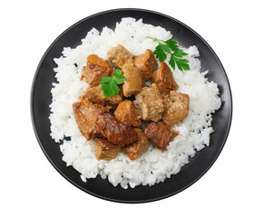 black plate with white rice and goulash isolated on white background. top view