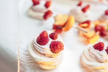Raspberry tartlet and sweet and sweet meringue