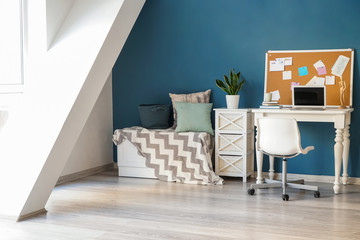 Interior of modern room with comfortable workplace