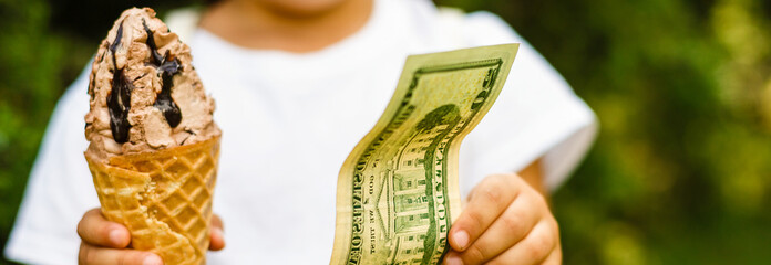 Close up portrait of hands and ice creams as payment is made