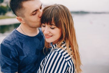 Fototapeta premium Beautiful couple spend time near the water