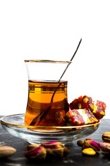 Arabic tea and desserts isolated on white