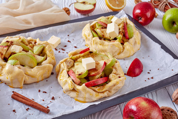 open apple pies, galettes with apple slices