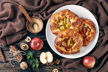 open apple pies, galettes with apple slices