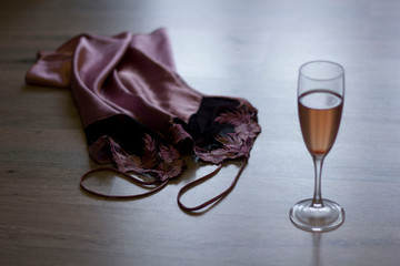 sexy lingerie, high heels and a glass of wine