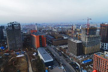 Aerial view. Construction of multi-storey residential buildings