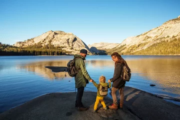 Muurstickers Happy family visit Yosemite national park in California © Maygutyak