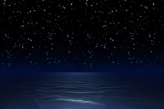 starry night sky at the ocean