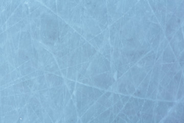 Ice hockey rink scratches surface abstract background.