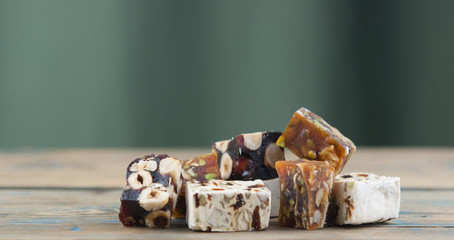 Turkish delight on a dark wood background