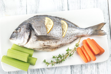 Baked dorada with fresh vegetables