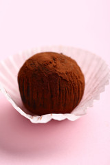 Dark Chocolate truffle on pink
