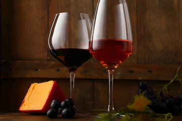 Wine drink in glasses on wooden boards