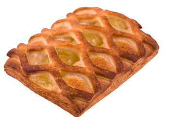 Homemade prirog with pear and lemon on a white background