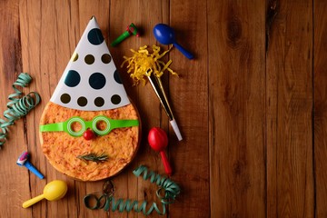 Party supplies near funny tasty pizza