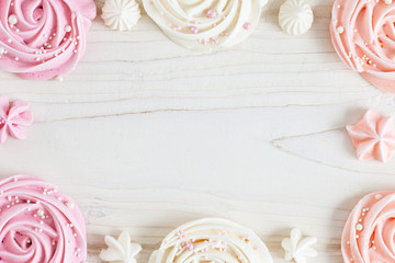 Beze or Meringues on wooden table. Homemade Meringue. Meringue made with love. Copy space. - obrazy, fototapety, plakaty
