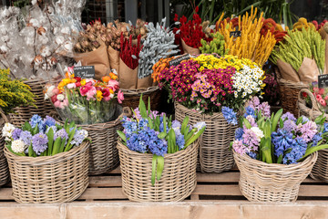 February 12th, 2019. Everyday flowers counter with variety of fresh cut flowers such as hyacinths, persian buttercups, chrysanthemums and some dried flowers for home decor at the greek garden shop.