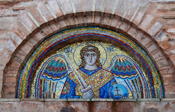 Saint Michael the Archangel with sword in right hand and mirror in the left hand - mosaic icon on the wall of St.Michael church in Vydubychi Monastery complex,Kiev,Ukraine