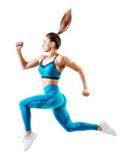 Young woman runner in blue sportswear jump in the air.