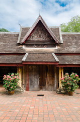 Antique Ceramic Roof of Porch's Gate of Wat Sisaket Monastery is a Landmark of Vientiane Capital City of Laos.