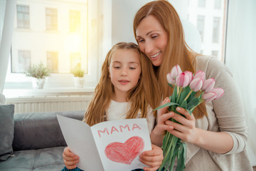 mother´s day with daughter and flowers