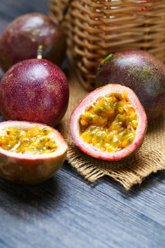 fresh passion fruit on dark wooden table