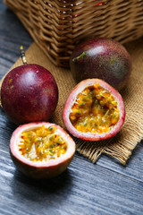 fresh passion fruit on dark wooden table