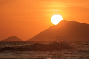 Poster beautiful sunset on the reserve beach (praia da reserva), recreio dos bandeirantes, rio de janeiro - brazil © marcioenrique