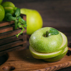 Set of green fruits for healthy diet and detox: apple, lime, kiwi, mango, carambola and mint.