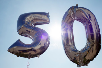 silver plastic  balloons for a 50th