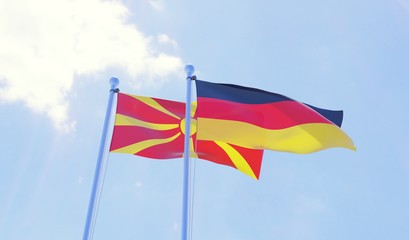 Macedonia and Germany, two flags waving against blue sky. 3d image