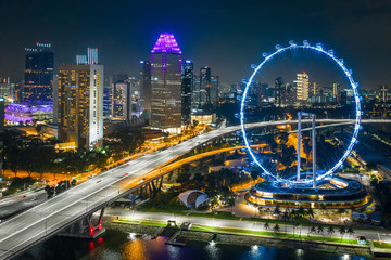 Flyer of Singapore - Wonderwheel of Singapore at night. Drone shoot of night skyline (Dji Mavic Pro 2)
