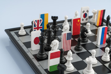 Symbols of the flags of the world on the chessboard. The concept of political game.