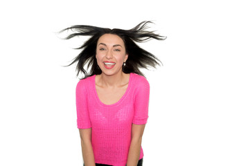 Portrait  of cheerful, funny, comic girl having flying hair isolated on white background, enjoying...