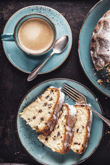 freshly baked gugelhupf with a cup of coffee crema