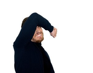 Portrait of  despair young man closed face by one hands. Isolated on a white background.