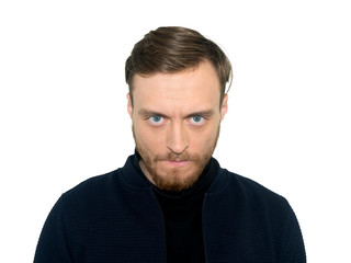 portrait of angry young man, isolated on white wall background. Negative human emotions facial expression feelings attitude.