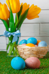 Easter Eggs with flower on Green Grass