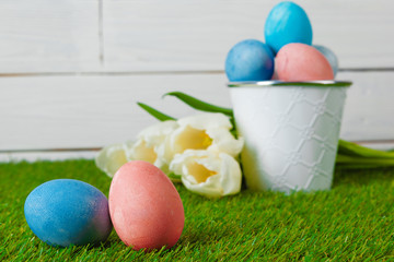 Easter Eggs with flower on Green Grass