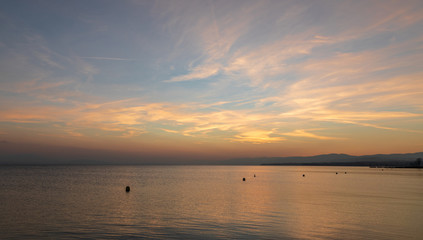 Fototapeta na wymiar Sunset. Peaceful. Water. Colorful. Leman. Lake. Sky