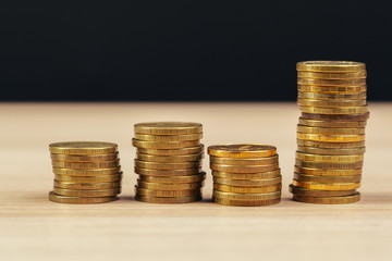 piles of coins on working table